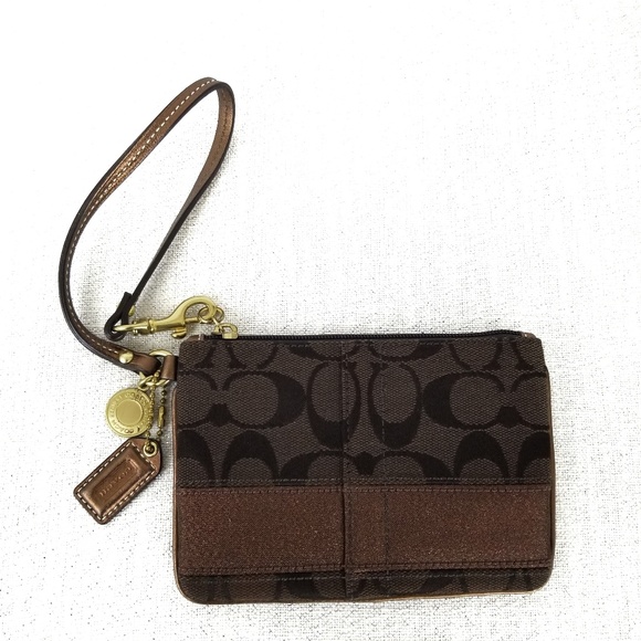 Coach Handbags - Coach brown wristlet with metallic bronze strip